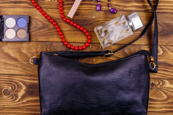 Women Accessories Wooden Background Clutch Bag Bottle Perfume Eye Shadow — Stock Photo, Image