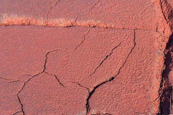 Textur Röd Våt Jord Förorenad Med Järnmalmsavfall — Stockfoto