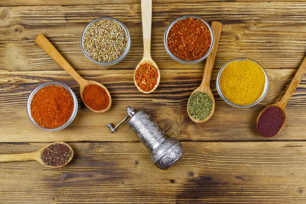 Set Different Aromatic Spices Spice Mill Wooden Table Top View — Stock Photo, Image