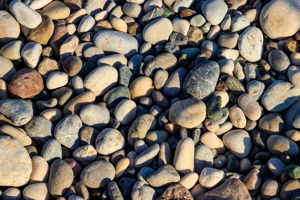 Glatte Runde Kieselsteine Textur Hintergrund Kieselstrand Aus Nächster Nähe — Stockfoto