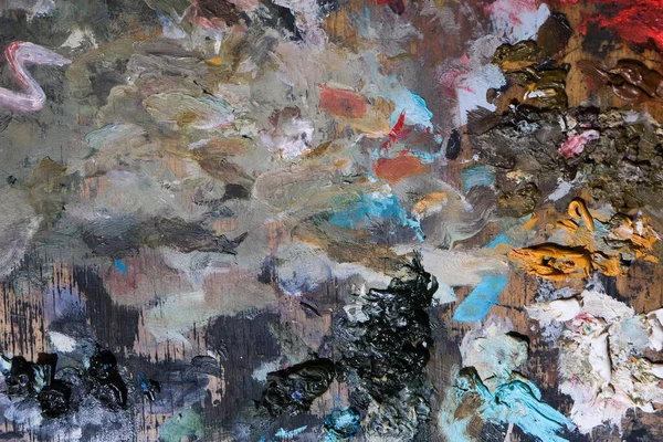 Kurumuş akrilik boyalı bir ressamın arka planı. Soyut bir sanat eseri..