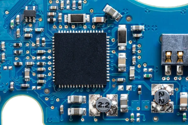 Local close-up of blue circuit board circuit of mechanical hard disk