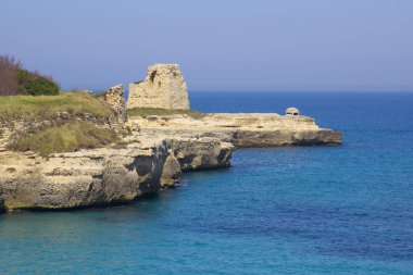 Scenic rocky cliffs on the waterfront of Salento clipart