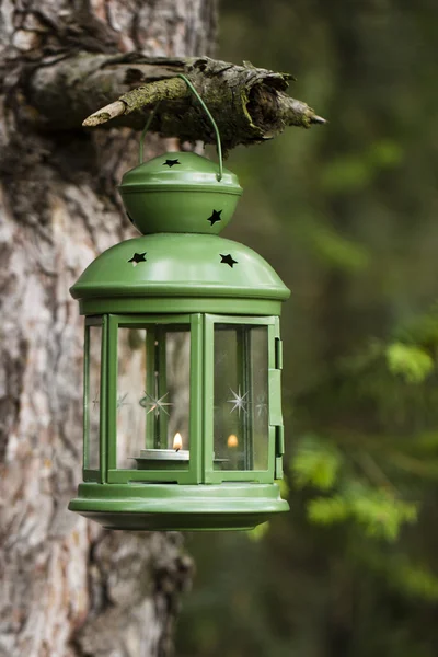 Green lantern with candle