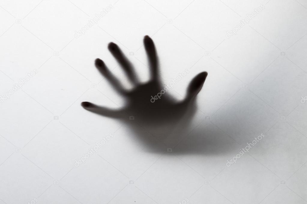 Silhouette of creepy hand