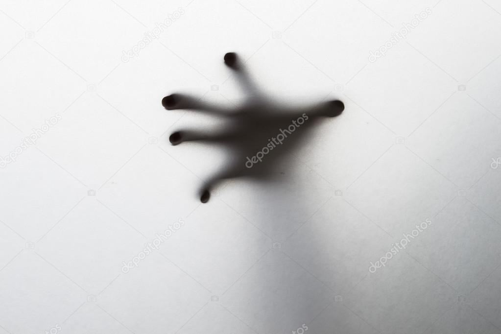 Silhouette of creepy hand