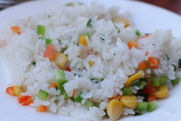 Tasty and Fresh Rice and Corn and Green Pea. Vegan Food. Non Veg
