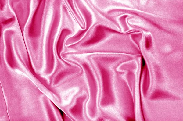 Όμορφη ομαλή ροζ μεταξωτά, υφασματεμπορία κλωστοϋφαντουργίας φόντο — Φωτογραφία Αρχείου