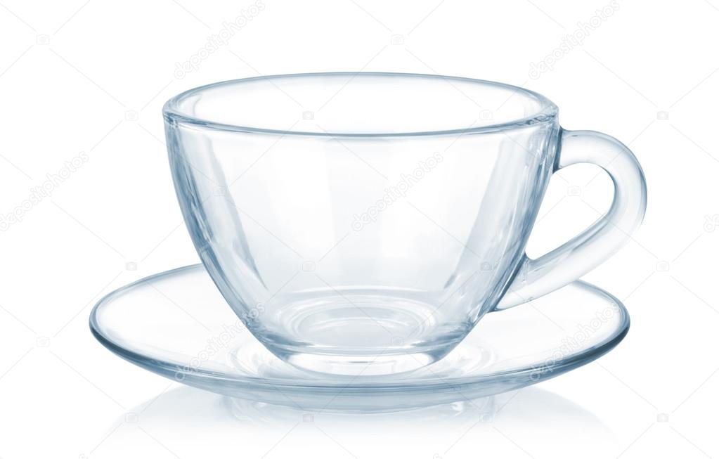 Glass cup and saucer isolated on white background