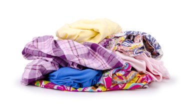 Heap of colorful clothes isolated on white background.