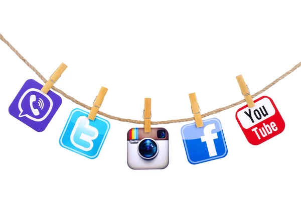 Popular social media Facebook, instagram, Viber, Twitter, YouTube hanging on the clothesline isolated on white background. — Stockfoto