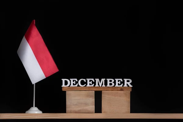 Ξύλινο Ημερολόγιο Δεκεμβρίου Τραπέζι Πολωνική Σημαία Μαύρο Φόντο Διακοπές Στην — Φωτογραφία Αρχείου