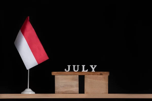 Houten Kalender Van Juli Met Poolse Vlag Zwarte Achtergrond Vakantie — Stockfoto