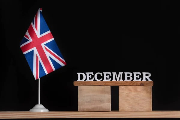 Ξύλινο Ημερολόγιο Δεκεμβρίου Σημαία Μεγάλης Βρετανίας Μαύρο Φόντο Χειμερινές Διακοπές — Φωτογραφία Αρχείου