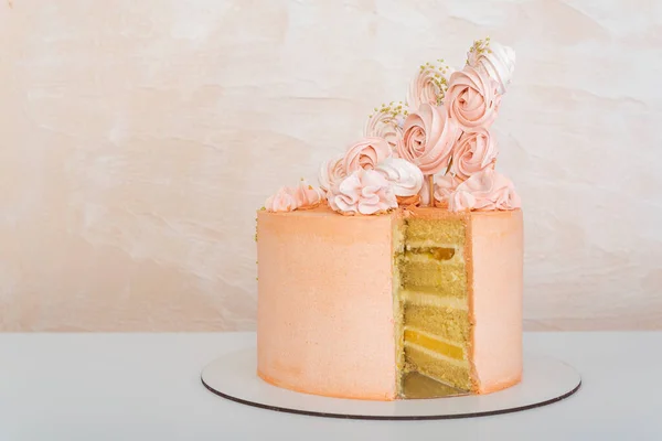 Designer sponge cake on light background. Cakes to order