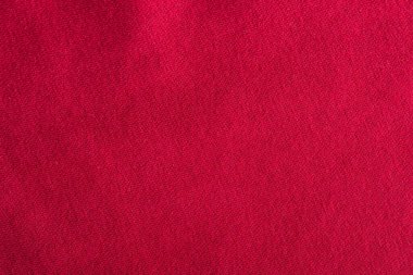 Kırmızı pamuklu kumaş. Kumaş dokusu, tekstil arkaplanı.