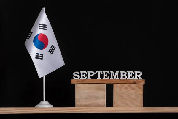 Calendário Madeira Setembro Com Bandeira Coreia Sul Fundo Preto Datas — Fotografia de Stock