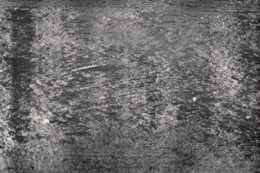 Gri soyut arkaplan ve pürüzlü doku. Renkli siyah yüzey