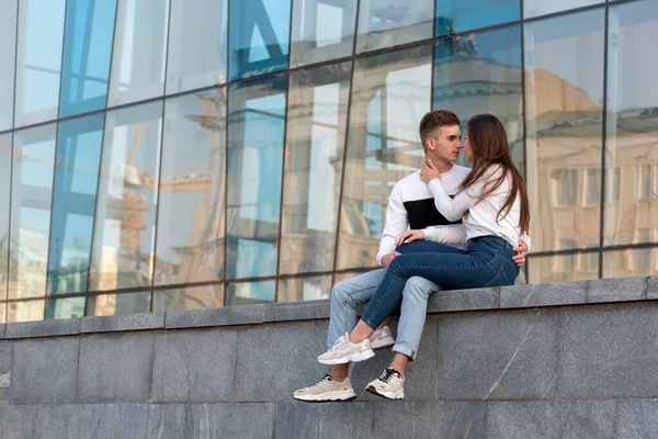 Young Couple Love Sits Building Whispers Girl Sitting Lap Guy — Stock Photo, Image