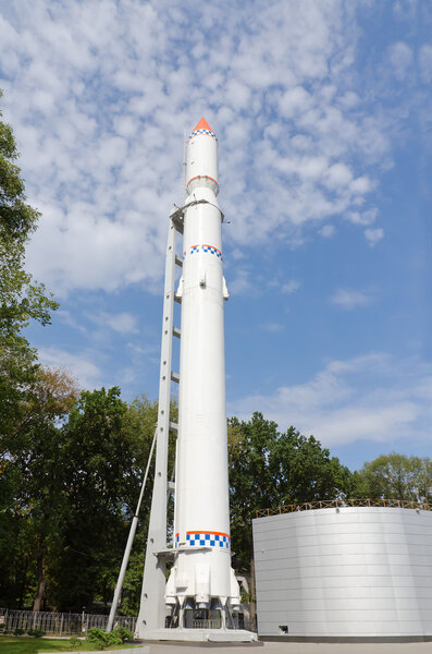 Space transport rocket in the park against the sky