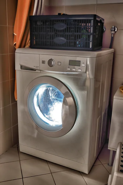 Washing machine with light inside — Stock Photo, Image
