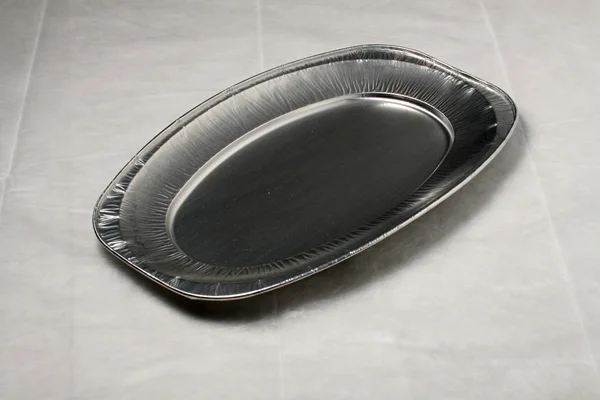 Empty aluminium plate — Stock Photo, Image
