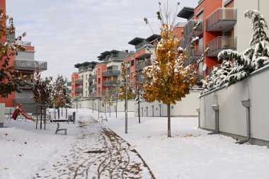 Residential block of houses in the winter clipart