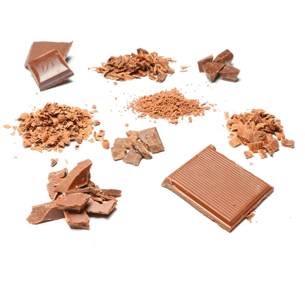 Schokoladenstücke, Riegel, Späne und Getreide - Perspektive — Stockfoto