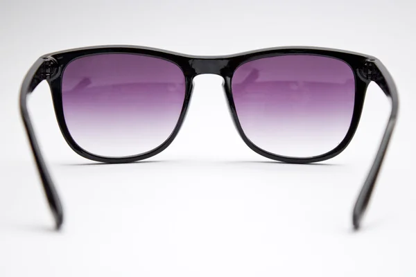 Violette Brille auf weißem Hintergrund — Stockfoto