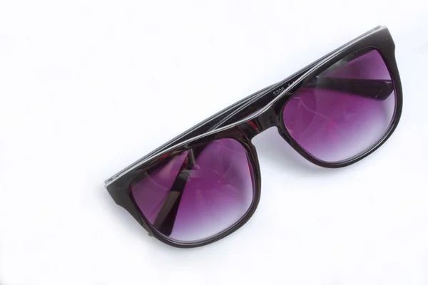 Óculos roxos no fundo branco — Fotografia de Stock