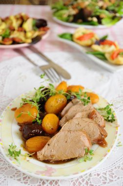 meat with fruit sauce