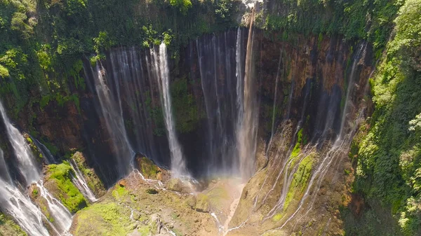 Many waterfalls, water falls off a sheer cliff, green, white, sun, summer, ecology