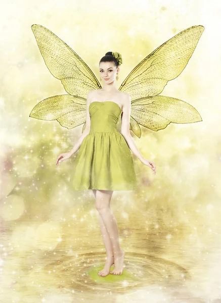 Beautiful young woman as spring fairy — Stock Photo, Image