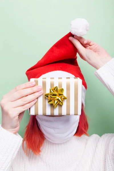 Girl White Sweater Santa Hat Wearing Protective Mask Face Holds — Stock Photo, Image