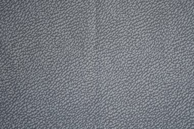 Gri kumaş arka plan yazdırma deri ile yakın çekim