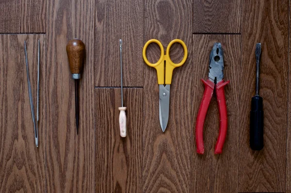 Wooden background with tools