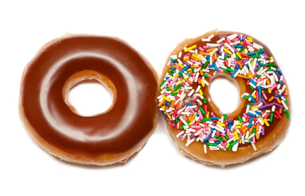 Schokolade und bunte Donuts — Stockfoto