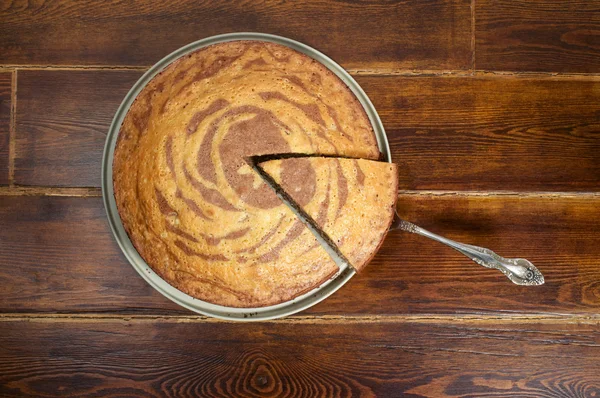 Zebra cake with spatula — Stock Photo, Image