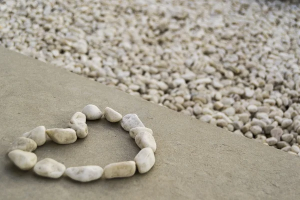 Heart stone on the floor — Stock Photo, Image