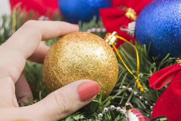 Christmas ornaments on red background — Stock Photo, Image