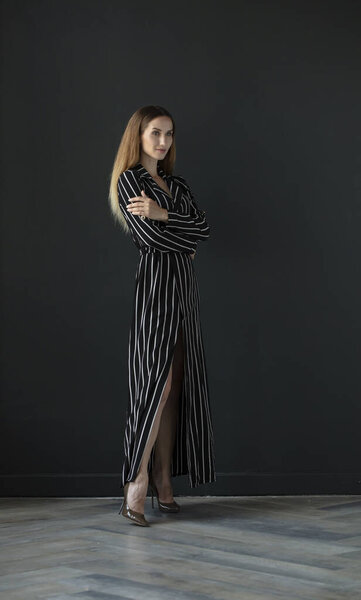  female model posing in studio, indoors