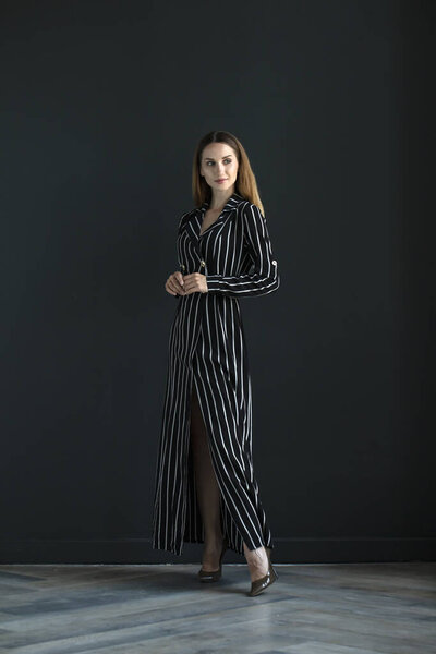  female model posing in studio, indoors