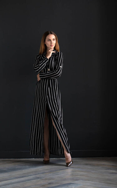  female model posing in studio, indoors