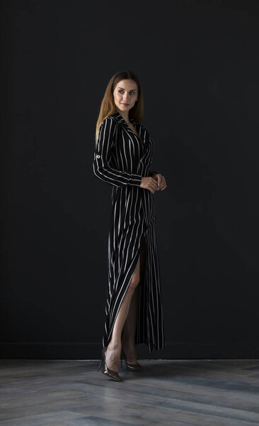  female model posing in studio, indoors