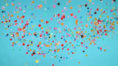 Renkli cam toplar aşağı doğru uçuyor