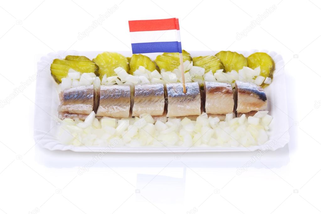 Dutch herring ('haring') with onions and pickles, isolated on white