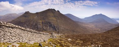 The Mourne Wall in the Mourne Mountains in Northern Ireland clipart