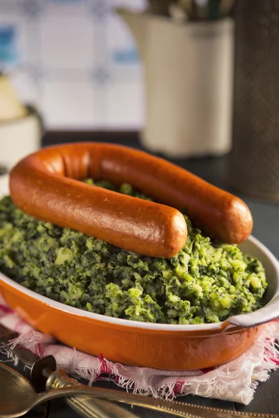 Dutch food: kale with smoked sausage or 'Boerenkool met worst' — Stok fotoğraf