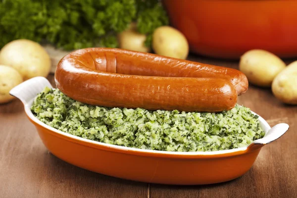 Dutch food: kale with smoked sausage or 'Boerenkool met worst' — Stok fotoğraf