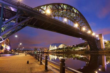 Bridges over the river Tyne in Newcastle, England at night clipart
